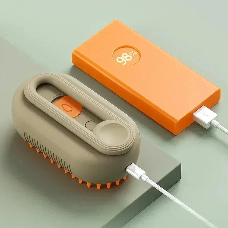 CoatGlo steam grooming brush removing loose pet hair